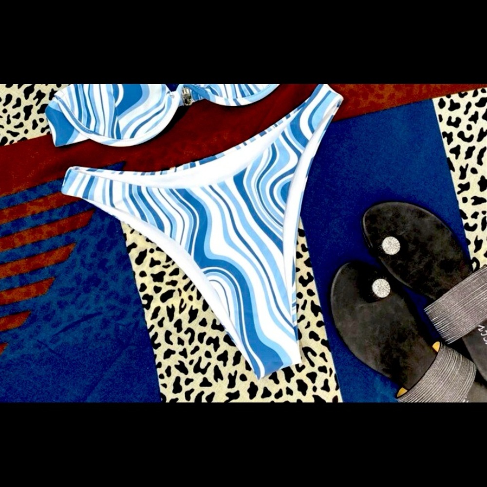 Swirly blue and white swim bottoms (only bottoms).